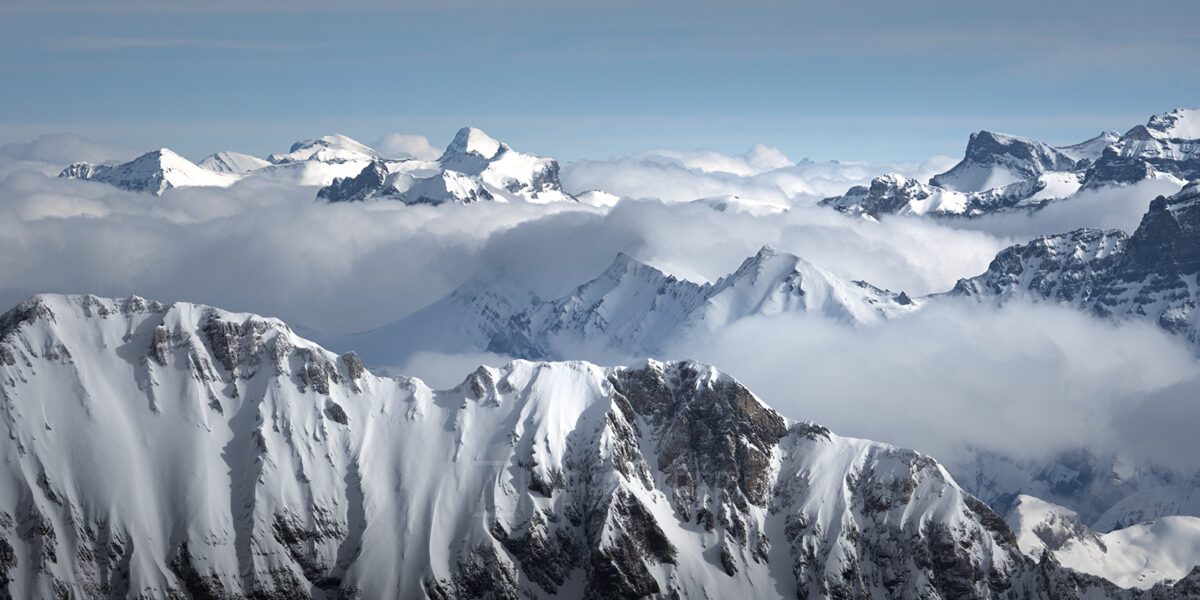 Fjell og skyer, fotokunst veggbilde / plakat av Kristoffer Vangen