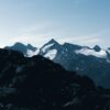 Utsikt over høye fjell i Jotunheimen, fotokunst veggbilde / plakat av Tor Arne Hotvedt